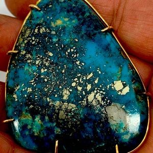 14k Turquoise Stone With Silver in it Pendant.